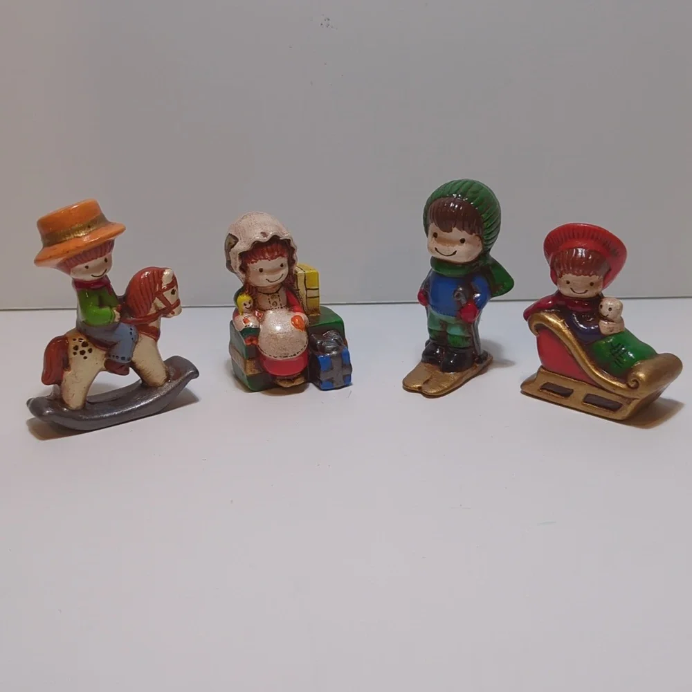 4 pc ceramic figures Karol Miller skier sleigh rocking horse boy girl winter